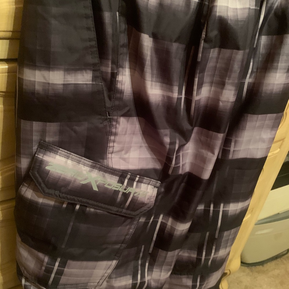 Be prepared with snow pants. Boys large 14-16 zeroxposur plaid black and grey